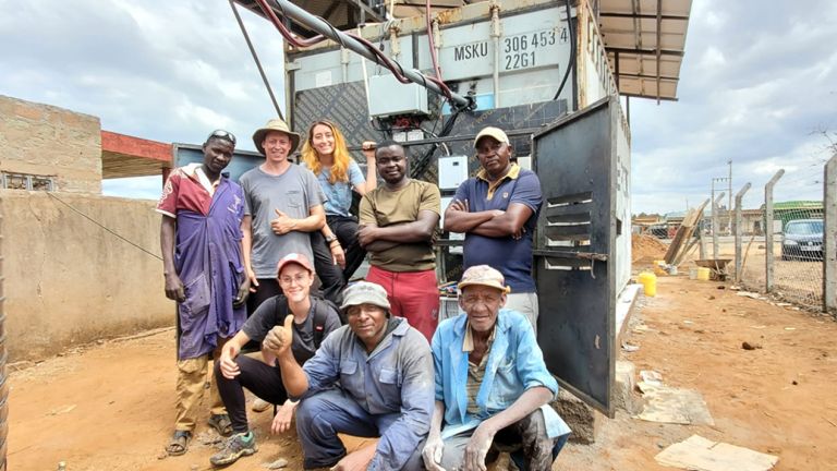 A team from MIT D-Lab and Kenyan community partner Solar Freeze celebrate the completion of the first solar-powered iteration of the forced-air evaporative cooling chamber. Using one-quarter of the energy of refrigerated cold rooms and at half the cost to build, the cooling chamber helps smallholder farmers in arid regions preserve and store freshly harvested produce.