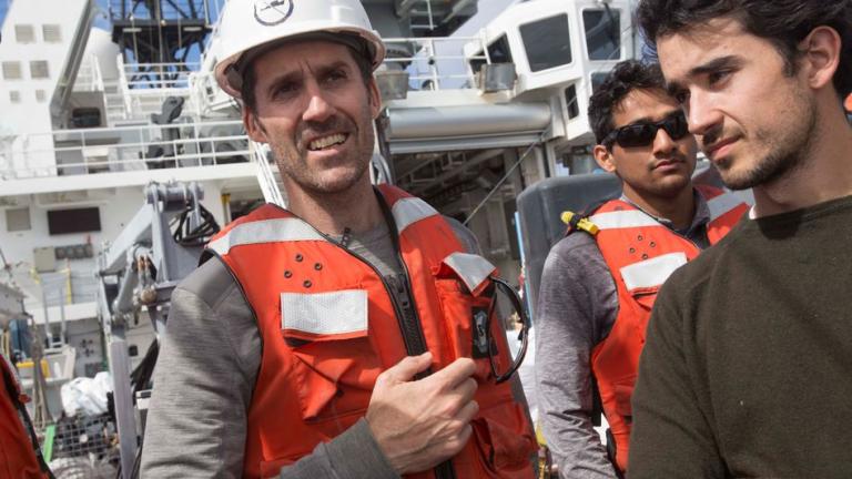 Professor Thomas Peacock (left) with graduate students Rohit Balasaheb Supekar (center) and Carlos Munoz Royo (right) aboard the RV Sally Ride.