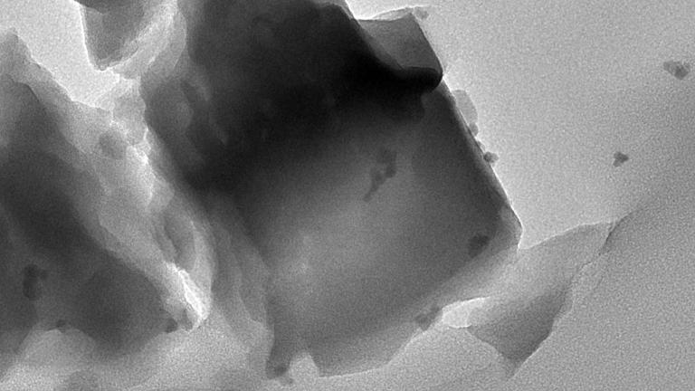 MIT chemical engineers designed a two-part catalyst that can convert methane gas to useful products. The catalyst consists of iron-modified aluminum silicate plus an enzyme called alcohol oxidase (enzyme not pictured).