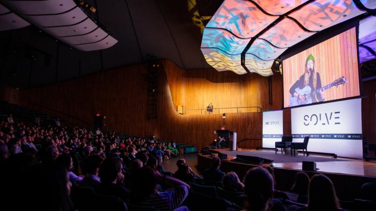 Globally recognized artist Beatie Wolfe commences Solve at MIT in Kresge Auditorium.