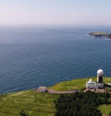 An aerial view of the Gosan Observatory, including the AGAGE station in Gosan, South Korea (lower left), which takes hourly measurements of more than 50 trace gases, including CFC-11.