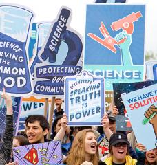 People with signs at a Climate March