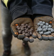 At HYBRIT's fossil-free steel plant in Luleå, Sweden, hydrogen made with renewable electricity turns reddish iron ore pellets, left, into grey pellets of sponge iron, which are ready to be melted down and made into steel.