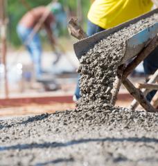 C-Crete, founded by Rouzbeh Savary PhD ’11, has created a more sustainable cement binding material that could significantly reduce the industry’s CO2 emissions. Pictured is a photo of traditional concrete being poured.