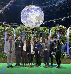 Members of MIT’s COP26 delegation stand for a portrait on Nov. 8. Approximately 20 individuals from MIT attended the conference. Left to right: Luis Gilberto Murillo-Urrutia, John Fernández, and Marcela Angel of the Environmental Solutions Initiative; Bethany Patten of the Sloan Sustainability Initiative; Martha Broad of the MIT Energy Initiative; graduate students Iulia-Madalina Streanga and Andreas Haupt; and postdoc Deepa Rao.