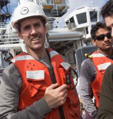 Professor Thomas Peacock (left) with graduate students Rohit Balasaheb Supekar (center) and Carlos Munoz Royo (right) aboard the RV Sally Ride.