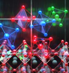 This image shows perovskite photovoltaics in the background with individual perovskite crystals shown as the colorful units. 