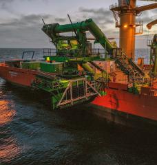 The Launch and Recovery System deploying the Patania II pre-prototype collector vehicle from the surface operations vessel MV Normand Energy.