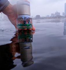 MIT researchers have built a battery-free pinpointing system dubbed Underwater Backscatter Localization (UBL). This photo shows the battery-free sensor encapsulated in a polymer before it is dipped into the Charles river.