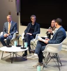 The main event of this year's Kendall Square Association annual meeting was a panel discussion about sustainability initiatives in the area. The panelists were, from left to right, Joe Higgins, vice president for campus services and stewardship at MIT; Stuart Brown, chief financial officer at Inari; and Emily Knight, chief operating officer at The Engine. At the far right, Lee McGuire, the chief communications officer of the Broad Institute of MIT and Harvard, moderated the discussion.