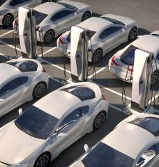 Cars parked at EV chargers