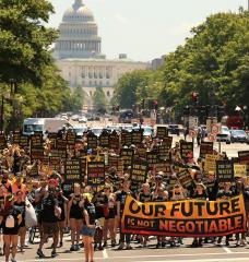 Climate protestors marching on capital hill