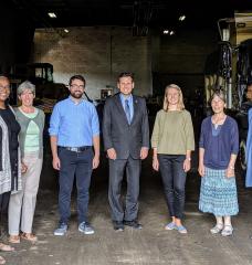 The Malden Works team gathered in the Malden, Massachusetts, Department of Public Works garage during a recent site tour: (left to right) Marcia Manong, Karen Buck, Evan Spetrini, Gary Christenson, Amber Christoffersen, Kathleen Vandiver, and Marie Law Adams.