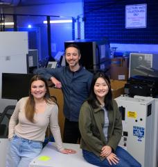 Left to right: Anastasia Duncan, Chris Rabe, and Jasmin Liu stand at the loading dock of MIT's Stata Center, where students and faculty go "crufting." Rabe facilitated an interdisciplinary working group of undergraduate and graduate students known as SERC Scholars to co-author a case study on the electronic hardware waste life cycle and climate justice.